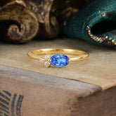 2 Prong Sapphire Oval Cut Ring with Sparkly Side Stones for Her